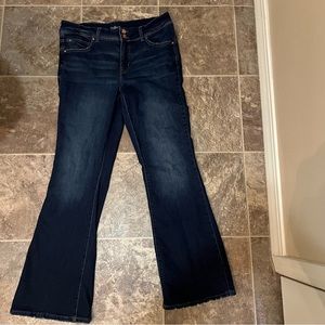 Women’s Ever flex mid rise boot cut jeans.